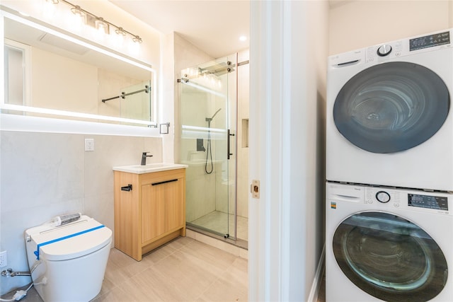 4209 Hampton St Unit 4B, Elmhurst, NY 11373 - full bath featuring estacked washer and dryer, a shower stall, vanity, and toilet