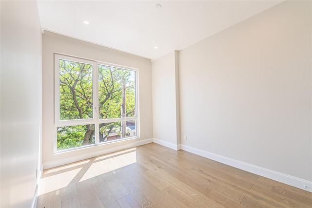 4209 Hampton St Unit 4B, Elmhurst, NY 11373 - empty room featuring light wood finished floors, baseboards, and recessed lighting