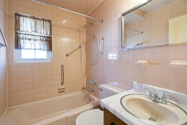 628 8th Ave, New Hyde Park, NY 11040 - full bath featuring bathtub / shower combination, vanity, and tile walls