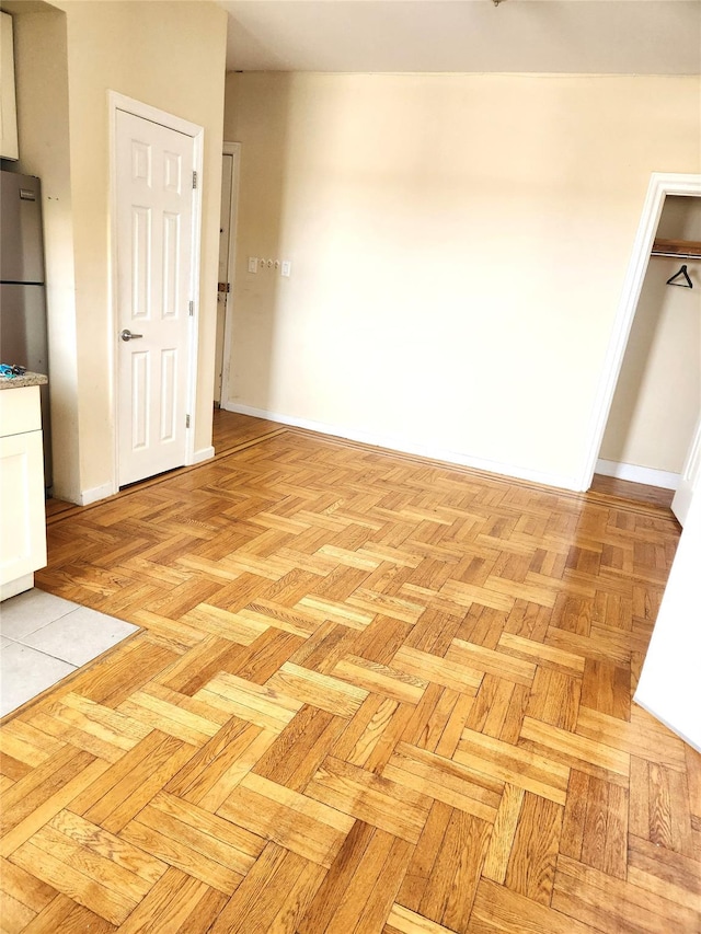 155-17 Sanford Ave Unit 5C, Flushing, NY 11355 - unfurnished dining area featuring baseboards
