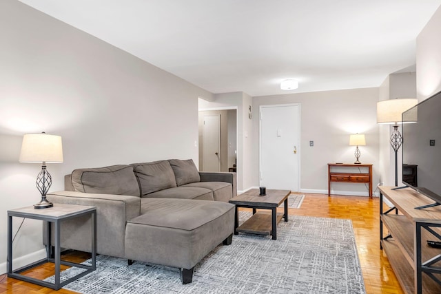 1 Birchwood Ct Unit 1N, Mineola, NY 11501 - living area featuring baseboards