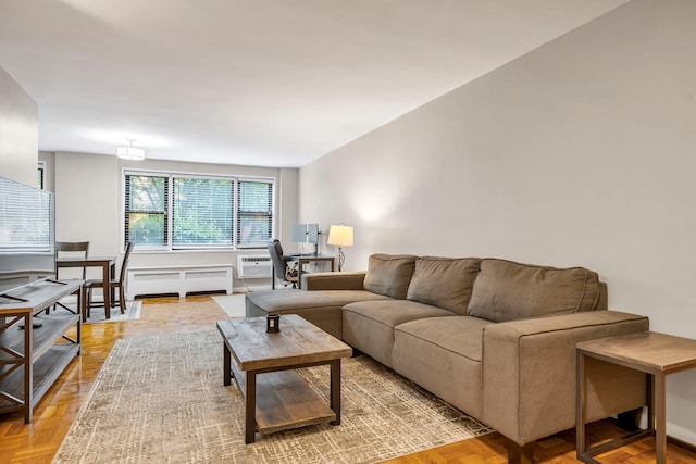 1 Birchwood Ct Unit 1N, Mineola, NY 11501 - living area with an office area, radiator heating unit, and an AC wall unit