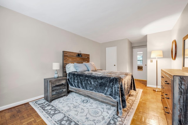 1 Birchwood Ct Unit 1N, Mineola, NY 11501 - bedroom with baseboards