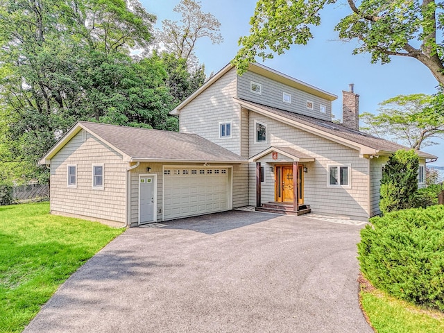 6 Riverside, Cornwall On Hudson, NY 12520 - view of front of property with an attached garage, driveway, a chimney, and roof with shingles