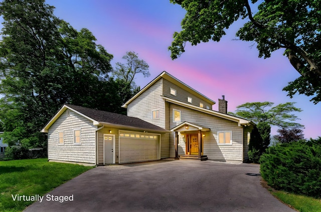 6 Riverside, Cornwall On Hudson, NY 12520 - view of front of home featuring asphalt driveway, a chimney, a garage, and a front yard