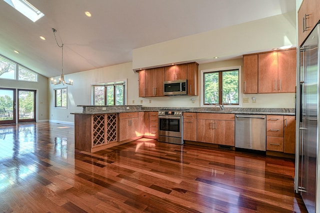 6 Riverside, Cornwall On Hudson, NY 12520 - kitchen featuring appliances with stainless steel finishes, a peninsula, healthy amount of natural light, dark wood-style floors, and recessed lighting