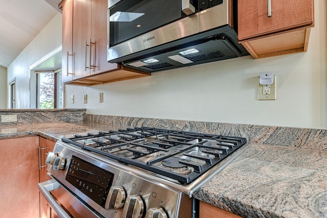 6 Riverside, Cornwall On Hudson, NY 12520 - kitchen with appliances with stainless steel finishes, brown cabinetry, and light stone countertops