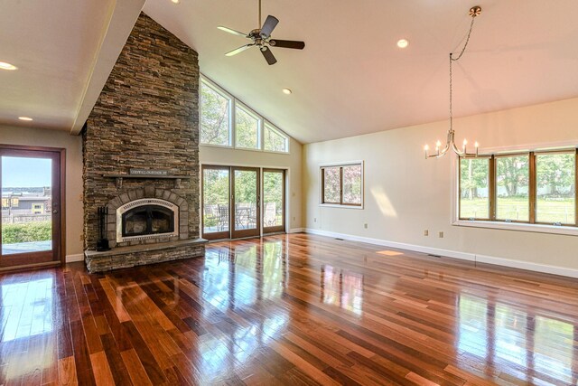 6 Riverside, Cornwall On Hudson, NY 12520 - unfurnished living room featuring hardwood / wood-style flooring, high vaulted ceiling, a chandelier, ceiling fan, and a fireplace