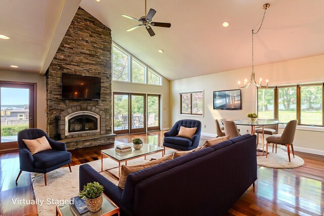 6 Riverside, Cornwall On Hudson, NY 12520 - living area featuring high vaulted ceiling, a chandelier, hardwood / wood-style floors, a stone fireplace, and ceiling fan