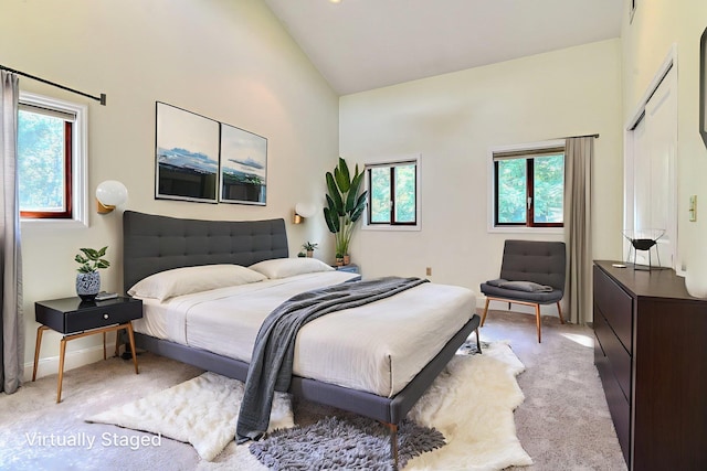 6 Riverside, Cornwall On Hudson, NY 12520 - bedroom featuring multiple windows, light carpet, and high vaulted ceiling