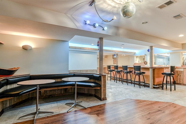 6 Riverside, Cornwall On Hudson, NY 12520 - dining space with wood finished floors, bar area, and recessed lighting