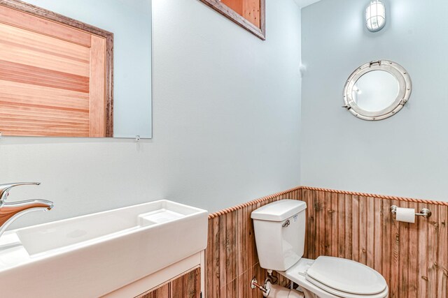 6 Riverside, Cornwall On Hudson, NY 12520 - half bathroom with wainscoting, vanity, and wooden walls