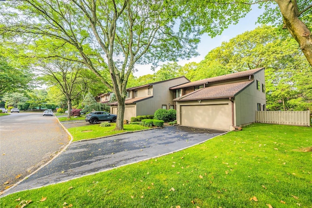43 Carriage Ct, Jericho, NY 11753 - mid-century inspired home featuring driveway, roof with shingles, and a garage