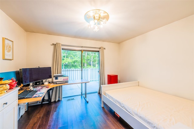 43 Carriage Ct, Jericho, NY 11753 - bedroom featuring dark wood finished floors, access to outside, a chandelier, and an office area