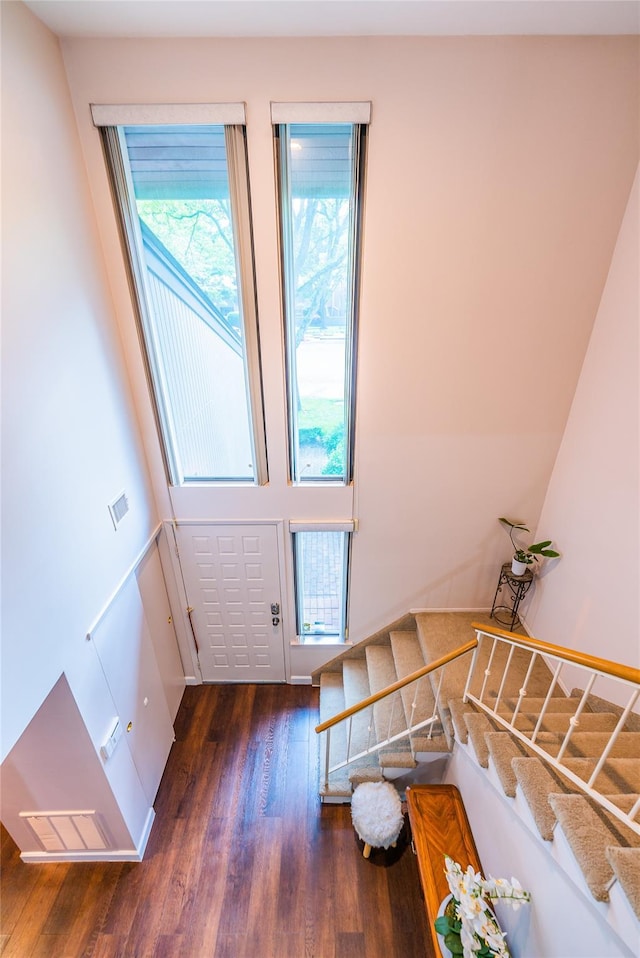 43 Carriage Ct, Jericho, NY 11753 - foyer with wood finished floors and stairway