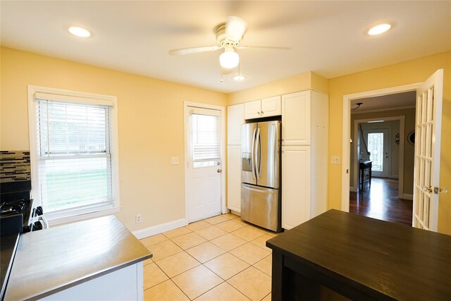56 Academy St, Patchogue, NY 11772 - kitchen with stainless steel fridge with ice dispenser, healthy amount of natural light, ceiling fan, and recessed lighting