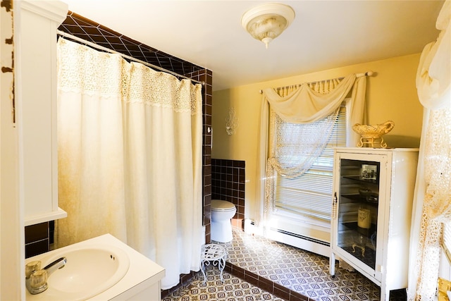 56 Academy St, Patchogue, NY 11772 - bathroom with tile walls, vanity, tile patterned floors, a wainscoted wall, and a shower with curtain