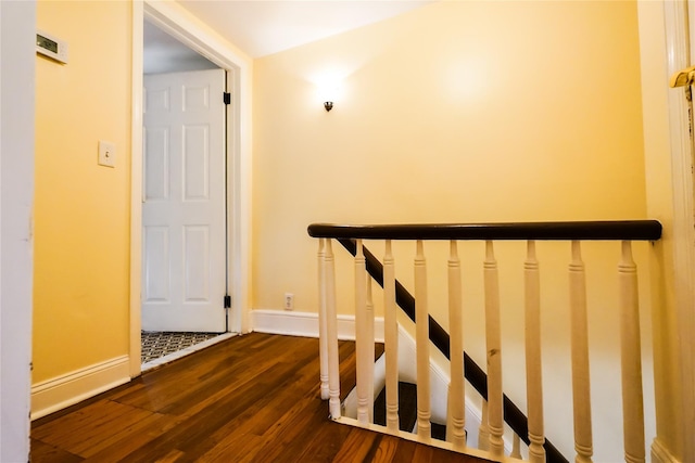 56 Academy St, Patchogue, NY 11772 - stairs featuring wood finished floors and baseboards