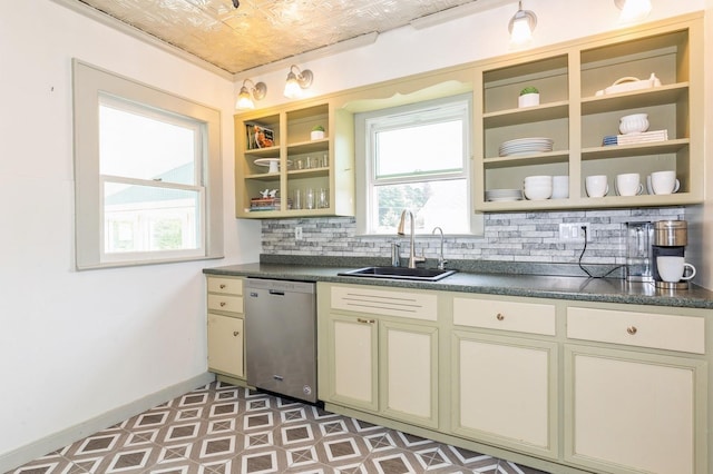 15 Orchard Rd, East Patchogue, NY 11772 - kitchen with stainless steel dishwasher, open shelves, dark countertops, and an ornate ceiling