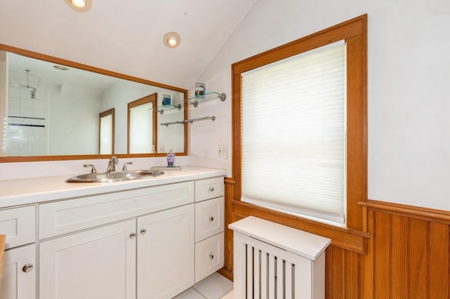 15 Orchard Rd, East Patchogue, NY 11772 - bathroom featuring vanity, lofted ceiling, wainscoting, and wooden walls