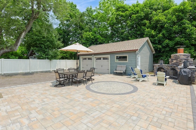 15 Orchard Rd, East Patchogue, NY 11772 - view of patio / terrace with an outdoor stone fireplace, outdoor dining area, a grill, an outdoor structure, and view of scattered trees