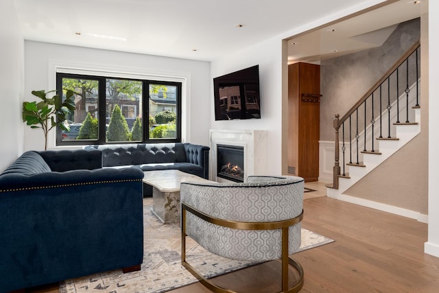 1363 Kearney Ave, Bronx, NY 10465 - living area with wood finished floors, a high end fireplace, and stairway