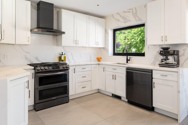1363 Kearney Ave, Bronx, NY 10465 - kitchen featuring wall chimney exhaust hood, dishwasher, double oven range, and white cabinets
