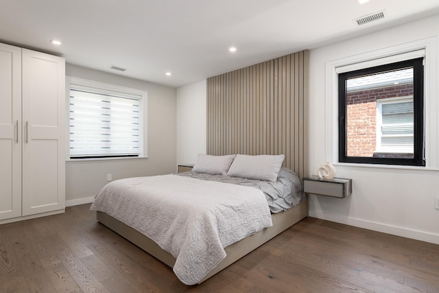 1363 Kearney Ave, Bronx, NY 10465 - bedroom featuring multiple windows, wood finished floors, and recessed lighting