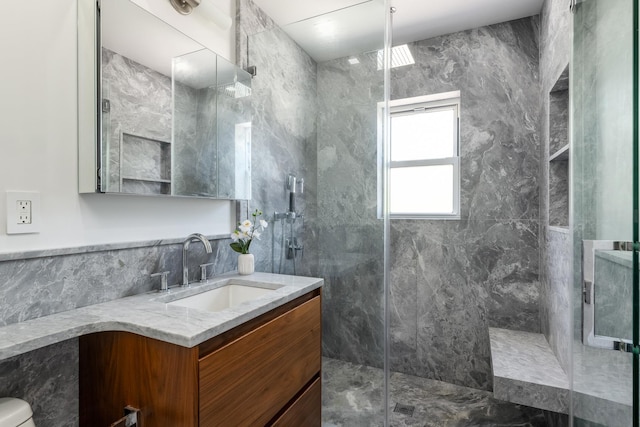 1363 Kearney Ave, Bronx, NY 10465 - full bath featuring tile walls, a marble finish shower, and vanity
