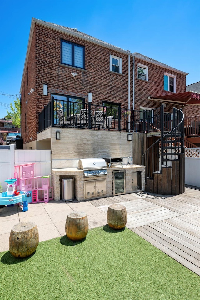1363 Kearney Ave, Bronx, NY 10465 - back of property with beverage cooler, area for grilling, stairway, and brick siding