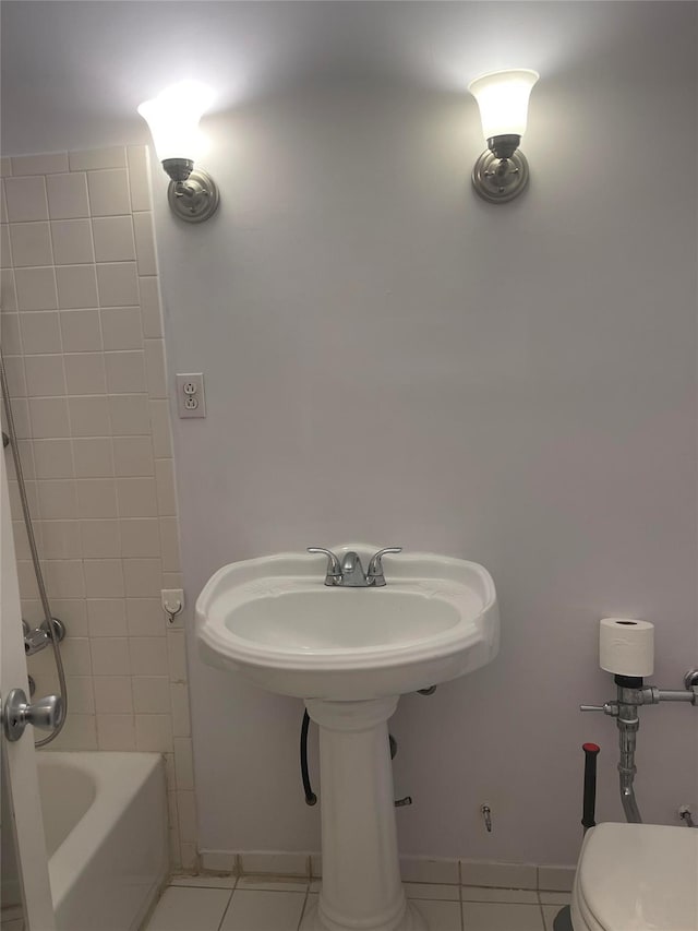 134-54 Maple Ave Unit 2S, Flushing, NY 11355 - full bath with tile patterned flooring, shower / tub combination, toilet, and baseboards