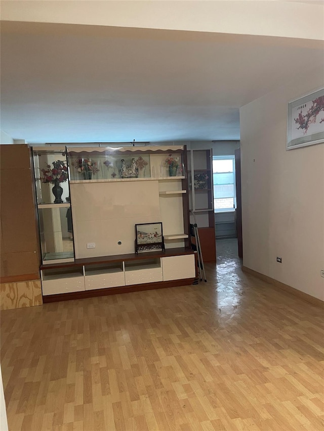 134-54 Maple Ave Unit 2S, Flushing, NY 11355 - unfurnished living room featuring light wood finished floors