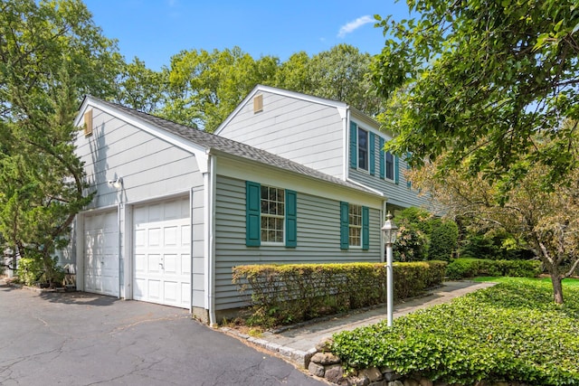 206 Lower Sheep Pasture Rd, Setauket, NY 11733 - view of property exterior featuring a shingled roof