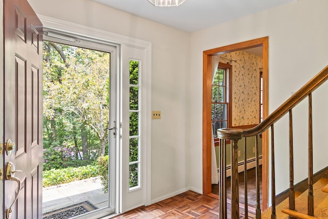 206 Lower Sheep Pasture Rd, Setauket, NY 11733 - foyer featuring plenty of natural light, stairway, and baseboard heating