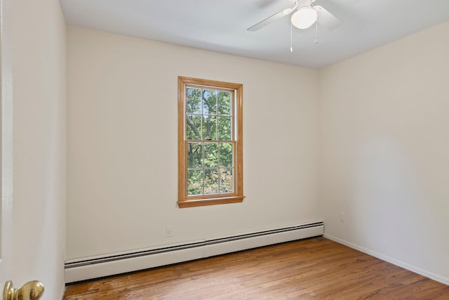 206 Lower Sheep Pasture Rd, Setauket, NY 11733 - unfurnished room featuring baseboard heating, wood finished floors, and ceiling fan