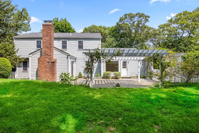 206 Lower Sheep Pasture Rd, Setauket, NY 11733 - back of house with a pergola, a patio area, a yard, and a chimney
