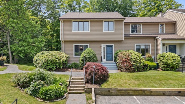 59 Krystal Dr, Somers, NY 10589 - view of front of house with uncovered parking and a front yard