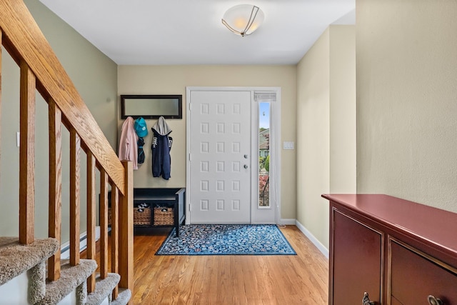 59 Krystal Dr, Somers, NY 10589 - entryway with light wood-type flooring and stairs