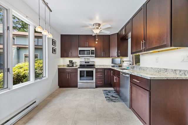 59 Krystal Dr, Somers, NY 10589 - kitchen with stainless steel appliances, a baseboard heating unit, ceiling fan, dark brown cabinets, and hanging light fixtures