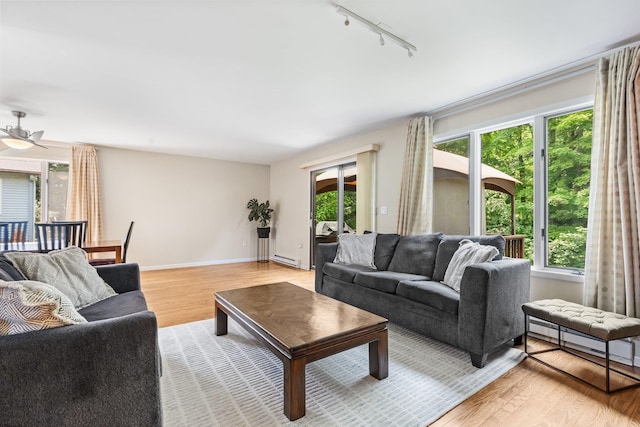 59 Krystal Dr, Somers, NY 10589 - living area with track lighting, plenty of natural light, light wood-type flooring, and a ceiling fan