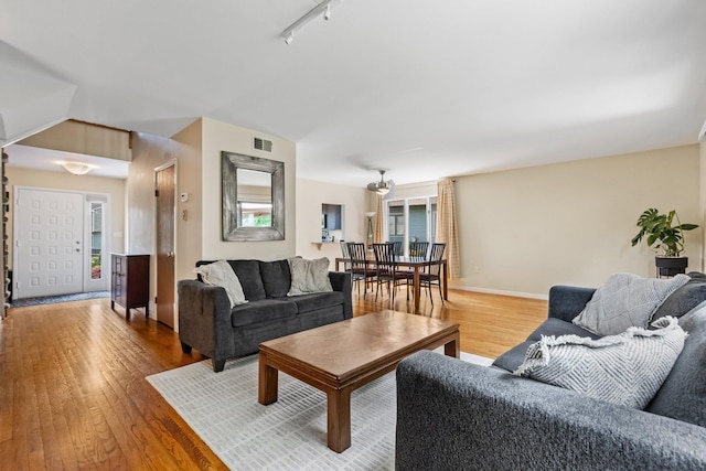59 Krystal Dr, Somers, NY 10589 - living room featuring light wood finished floors and track lighting