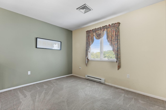 59 Krystal Dr, Somers, NY 10589 - spare room featuring a baseboard heating unit and carpet floors
