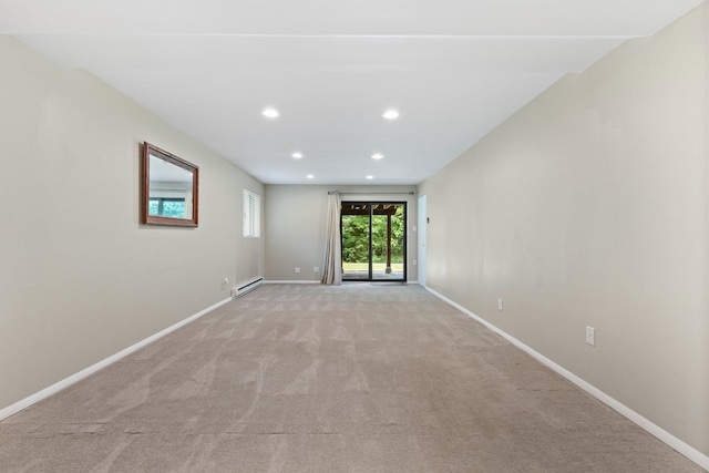 59 Krystal Dr, Somers, NY 10589 - spare room with light carpet, recessed lighting, and a baseboard radiator