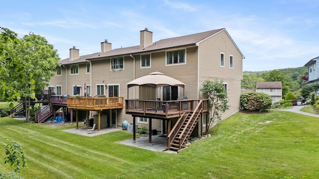 59 Krystal Dr, Somers, NY 10589 - rear view of house with stairs, a deck, a patio area, and a yard