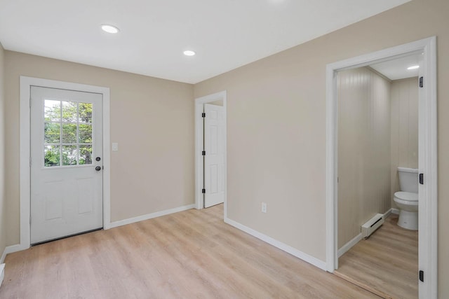 18 Port Jefferson Rd, Sound Beach, NY 11789 - foyer entrance with a baseboard radiator, light wood-type flooring, baseboards, and recessed lighting