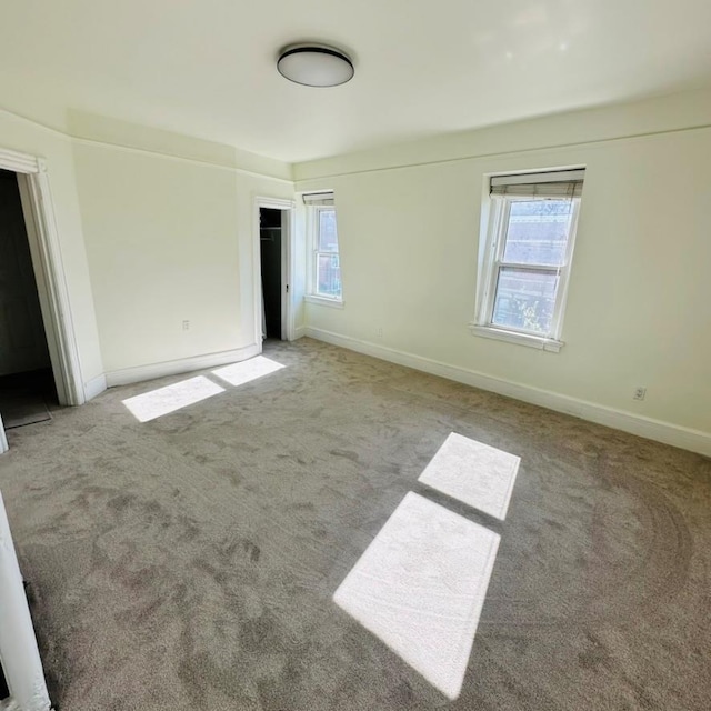 22 Spring St, Port Chester, NY 10573 - carpeted spare room featuring healthy amount of natural light and baseboards