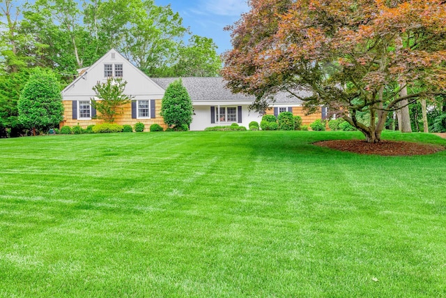 2 The Spout, Smithtown, NY 11787 - view of front of house featuring a front lawn and roof with shingles