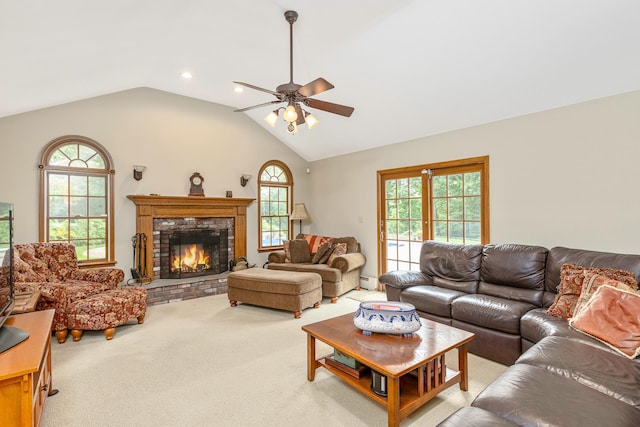 2 The Spout, Smithtown, NY 11787 - carpeted living room with ceiling fan, vaulted ceiling, a fireplace, recessed lighting, and a baseboard radiator