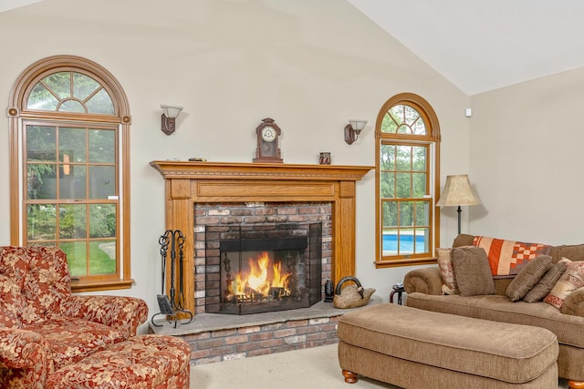 2 The Spout, Smithtown, NY 11787 - carpeted living area with a fireplace and high vaulted ceiling