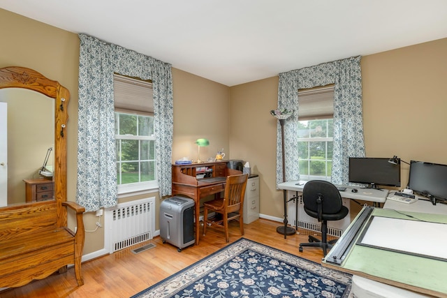 2 The Spout, Smithtown, NY 11787 - office featuring radiator heating unit, plenty of natural light, and wood finished floors